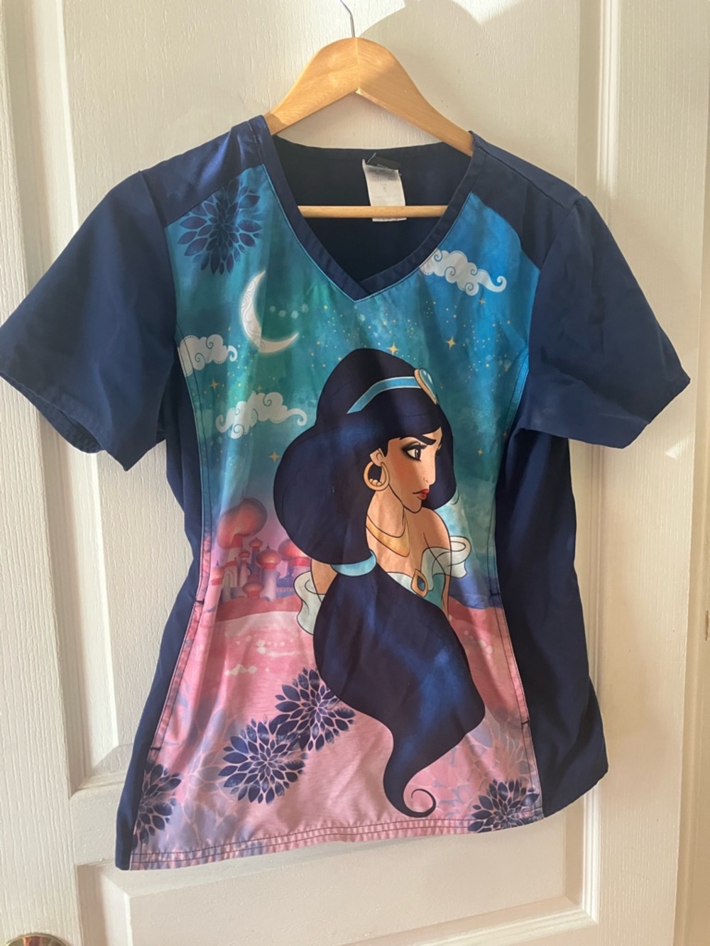 Disney Women’s Navy, Teal & Pink Jasmine V-Neck Graphic Scrub V-Neck shirt